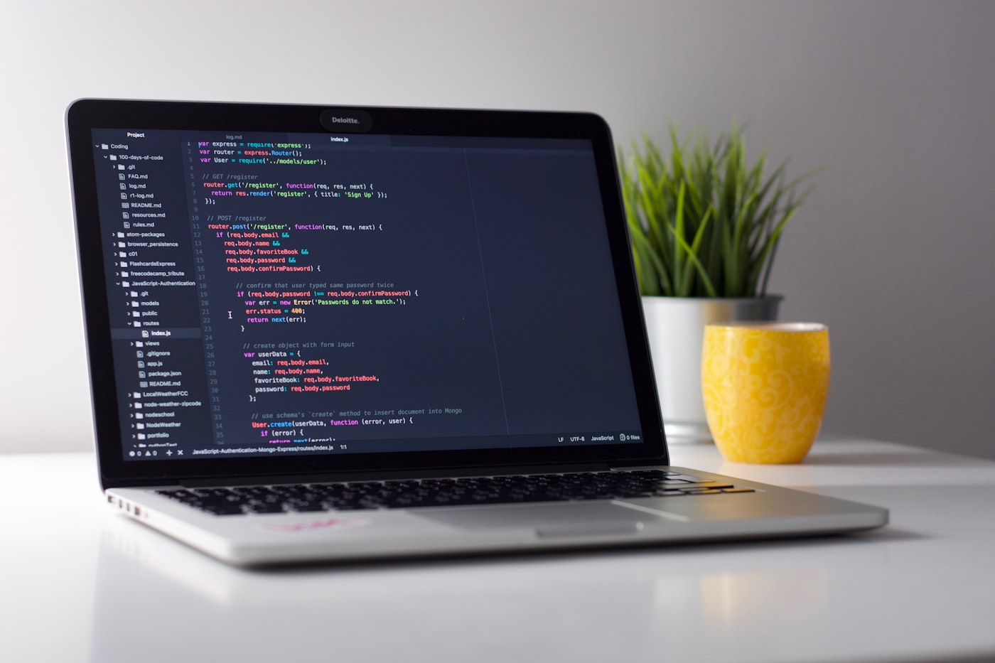 Custom web design code on a developer's screen